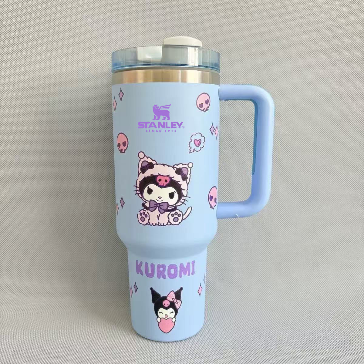 Stanley 40oz insulated tumbler featuring Kuromi character illustrations, pastel purple design