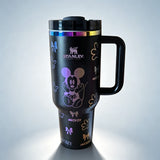Stanley 40oz insulated tumbler featuring Mickey Mouse illustrations, bows and glove icons