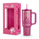 Stanley x Barbie pink metallic tumbler with handle and straw, displayed next to its pink Barbie-themed packaging.