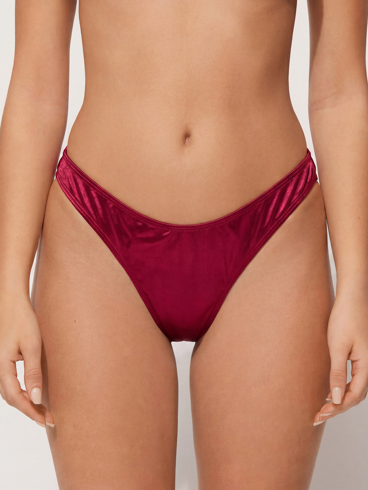 Sexy brasilianische freche Glitzer-Bikinihose mit hohem Beinausschnitt und fester Farbe