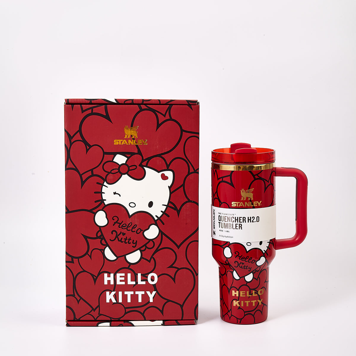 Stanley x Hello Kitty Quencher H2.0 Tumbler in red next to its matching gift box