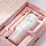 Close-up of Stanley x LoveShackFancy Quencher H2.0 FlowState Tumbler inside its gift box, pink floral print