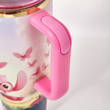 Close-up of the pink handle on the Stanley travel tumbler